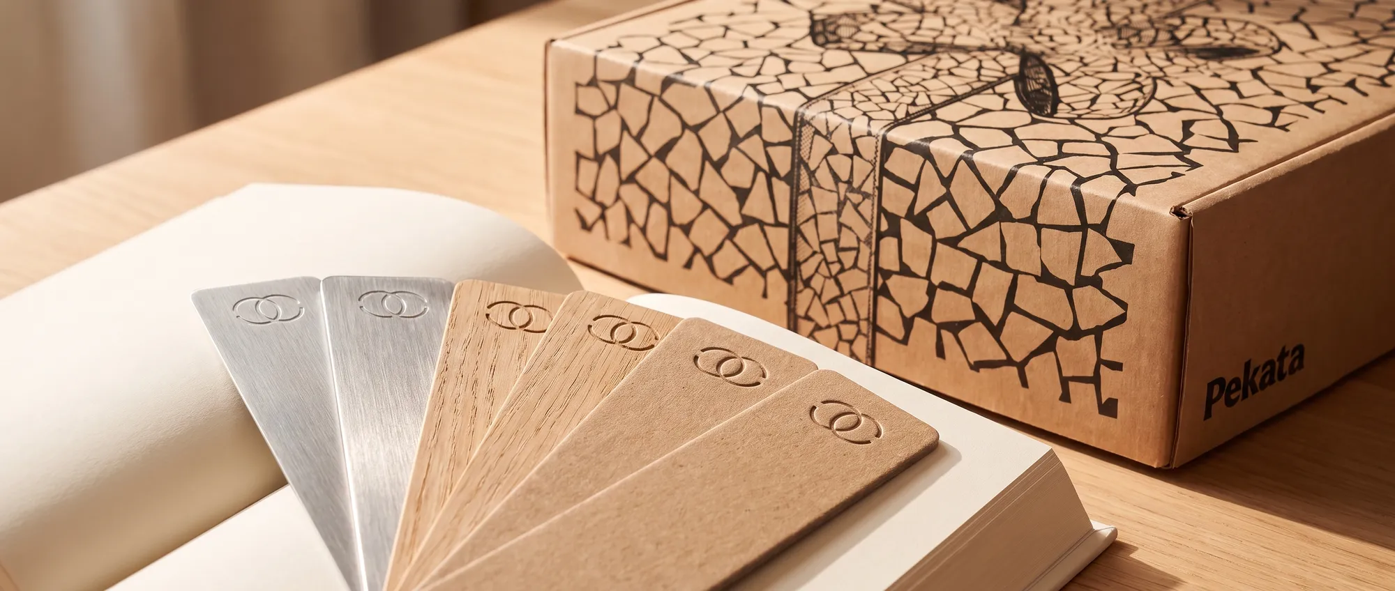Custom bookmarks in card, wood and metal with a company logo